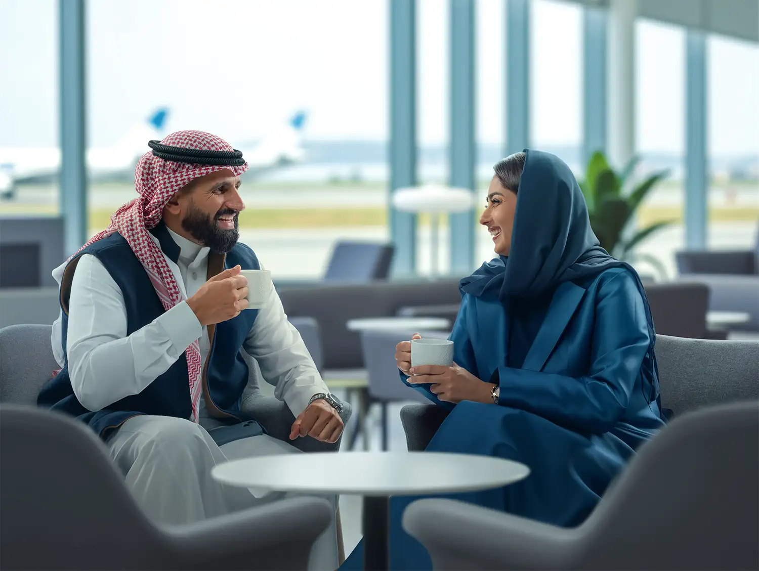 Mobily colleagues in conversation at the office